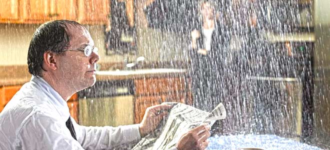 How to Keep Your Drains Clean with Environmentally-Friendly Methods 5 water leaking on man in kitchen