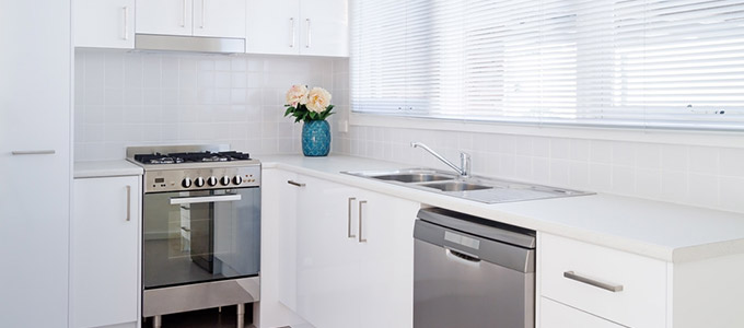a beautiful kitchen in a toronto condo after being renovated and updated by a licensed toronto plumber