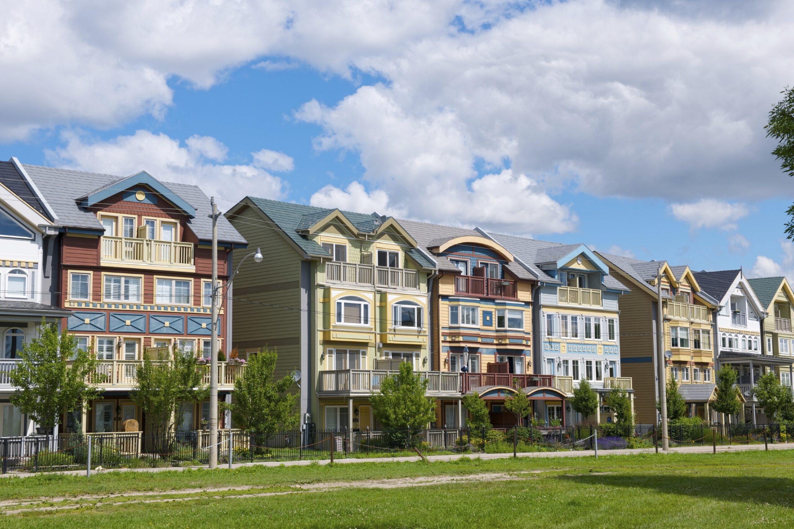 toronto homes are visible, viewed from across the street in the beaches area