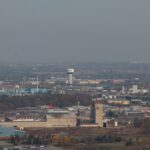 milton, ontario viewing the industrial area and water tower featuring the milton sign
